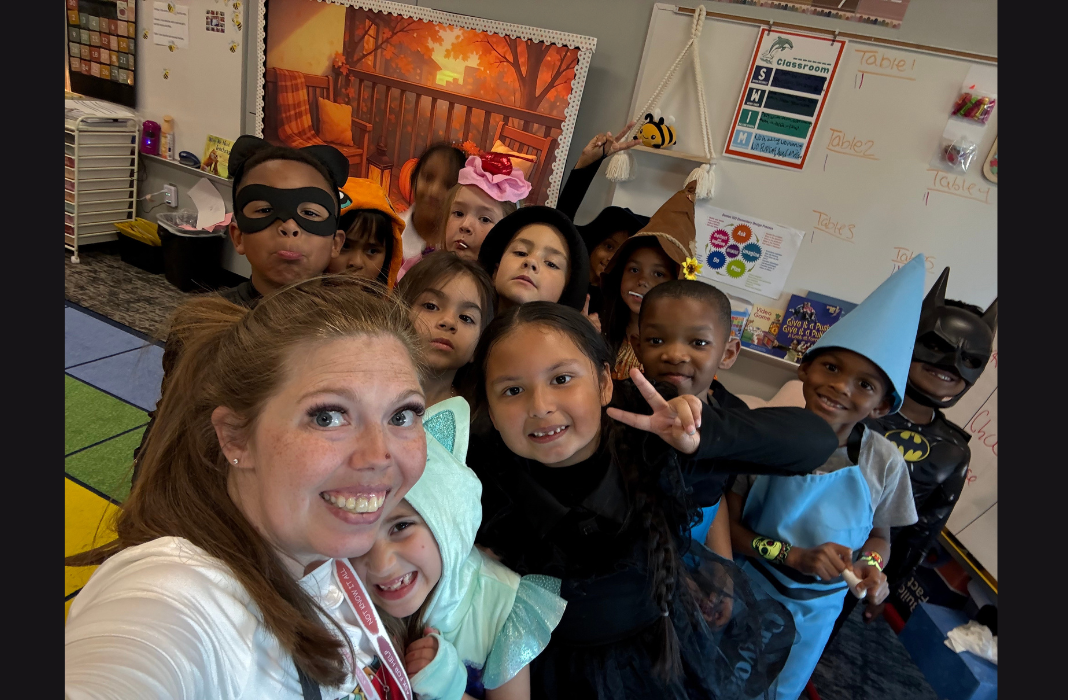  students wearing book character costumes